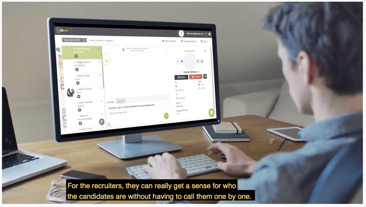 Recruiter using Talkpush software looking at computer screen