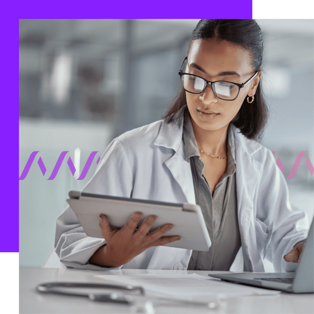 Key Tech Challenges for Healthcare Image of a woman wearing a white coat and looking at a table screen