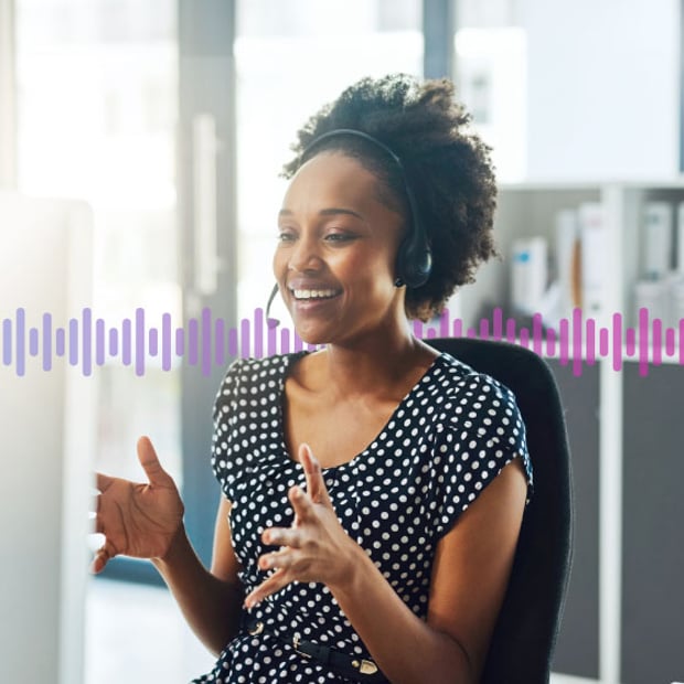 SEO Outbound Call Center Blog Header Photo of a call center agent talking to a customer on her headset. In the background are a series of small purple "sound waves" representing communications.