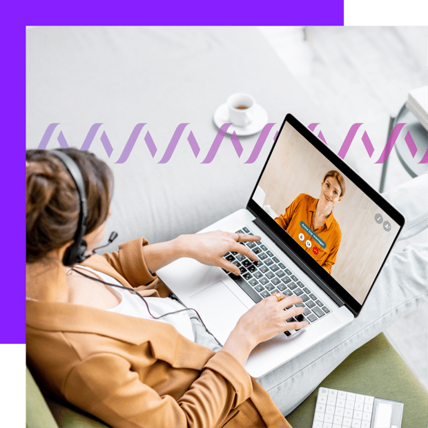 Advantages of Video Conferencing header Photoillustration of a woman on a video call on herlaptop