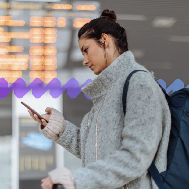 Image of a woman using her mobile phone to work while traveling. Image of a woman using her mobile phone to work while traveling.