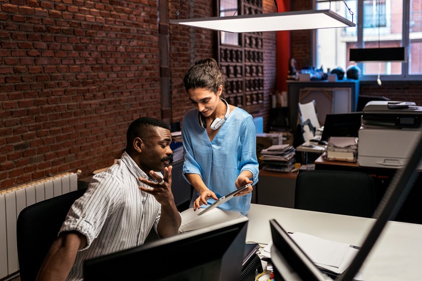 Business People Analyzing Documents Business people having meeting in modern office.They working together in creative office