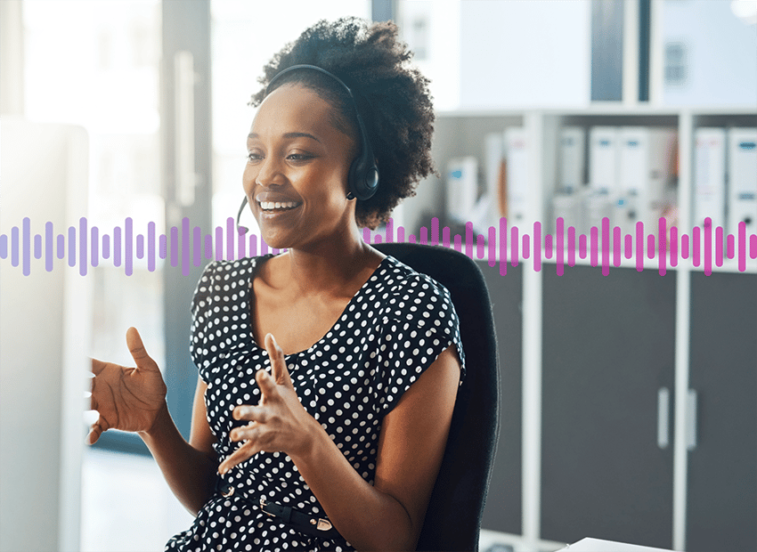A sales agent talking to a customer on a headset