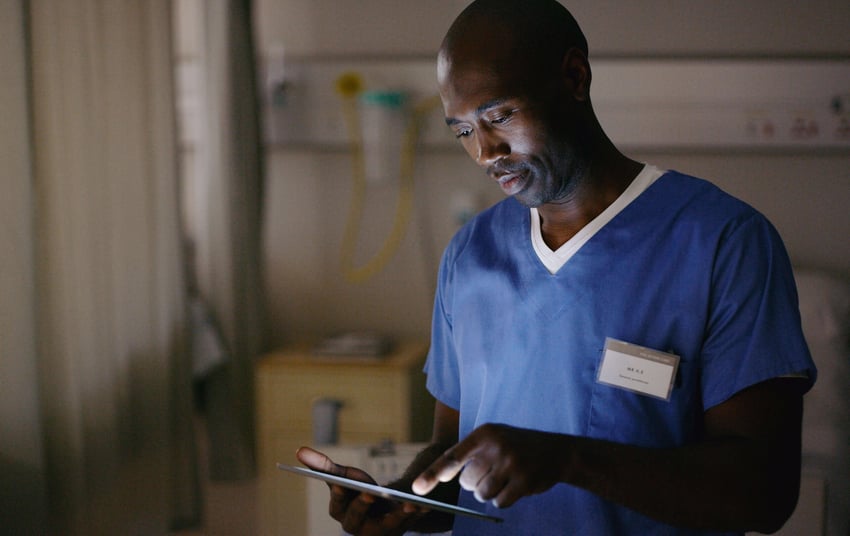 Shot of a medical practitioner using a digital tablet in a hospital ward