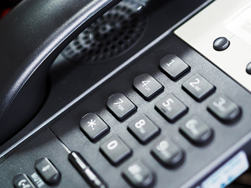 Close up of dialpad An IP Phone in soft light
