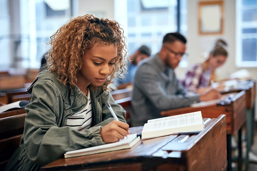 Cropped shot of university students sitting in class