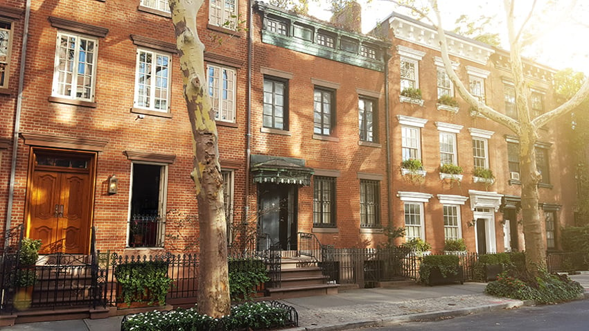 Row of residential brownstones and townhouses.