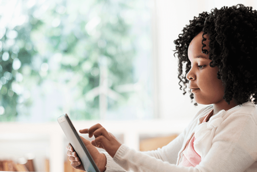 Video in Education young girl using a tablet at home