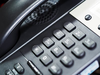 Close up of dialpad An IP Phone in soft light